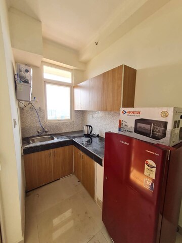 Kitchen in 2 BHK Apartment at Nimbus The Hyde park, Sector 78 – for Rent