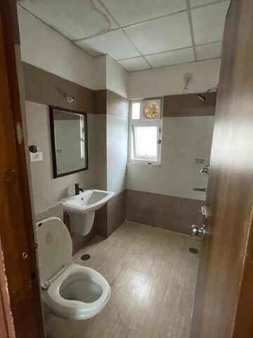 Bathroom in 3 BHK Apartment at Mahagun Mezzaria, Sector 78 – for Rent