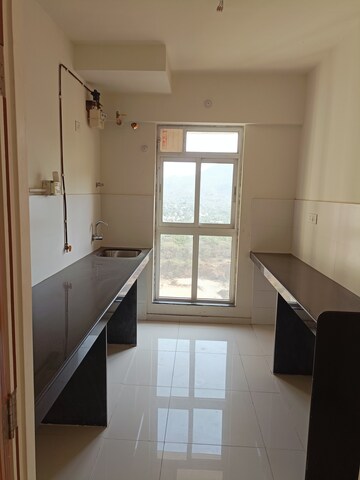 Kitchen in 2 BHK Apartment at Godrej Emerald, Ghodbunder Road – for Sale