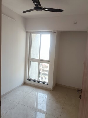 Room in 1.5 BHK Apartment at Godrej Emerald, Ghodbunder Road – for Sale