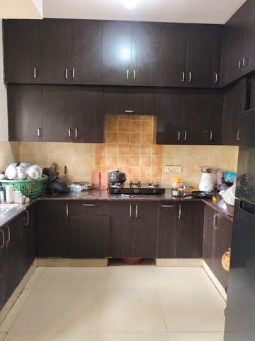 Kitchen in 3 BHK Apartment at Gardenia Golf City, Sector 75 – for Rent