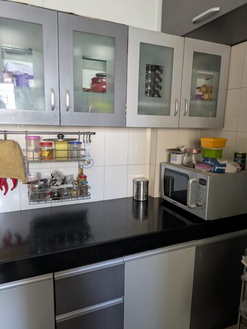 Kitchen in 2 BHK Apartment at Gulmohar Orchids, Kharadi – for Rent