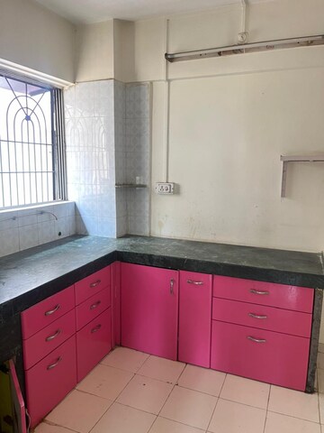 Kitchen in 1 BHK Apartment at Anuj Co-Op Housing Society, Wadgaon Sheri – for Rent