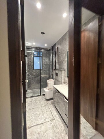 Bathroom in 4 BHK Builder Floor at Green Park Extension – for Sale