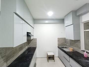 Kitchen in 3 BHK Apartment at Adani Oyster Grande Phase 2, Sector 102 – for Rent