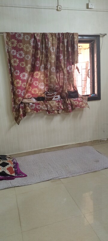 Bedroom in 1 BHK Apartment at Sahyog CHS Seawoods, Nerul – for Rent