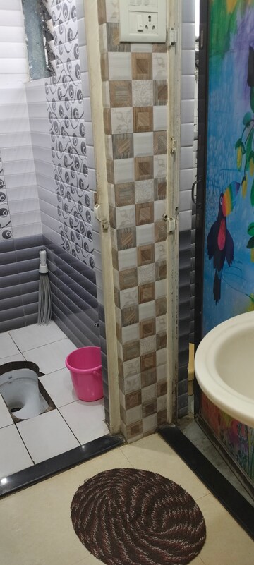 Bathroom in 1 BHK Apartment at Sahyog CHS Seawoods, Nerul – for Rent