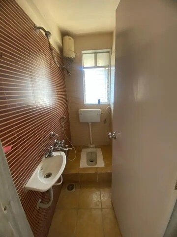Bathroom in 1.5 BHK Apartment at Runwal Euphoria, Kondhwa – for Rent