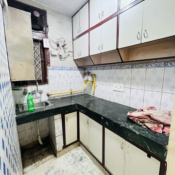 Kitchen in 2 BHK Builder Floor at Khirki Extension – for Rent