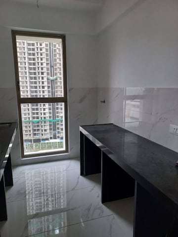 Kitchen in 2 BHK Apartment at Raymond Ten X Habitat, Pokhran Road No Two – for Rent