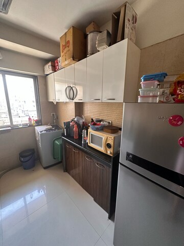 Kitchen in 3 BHK Apartment at Romell Diva, Malad West – for Sale