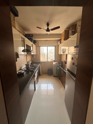 Kitchen in 3 BHK Apartment at Romell Diva, Malad West – for Sale