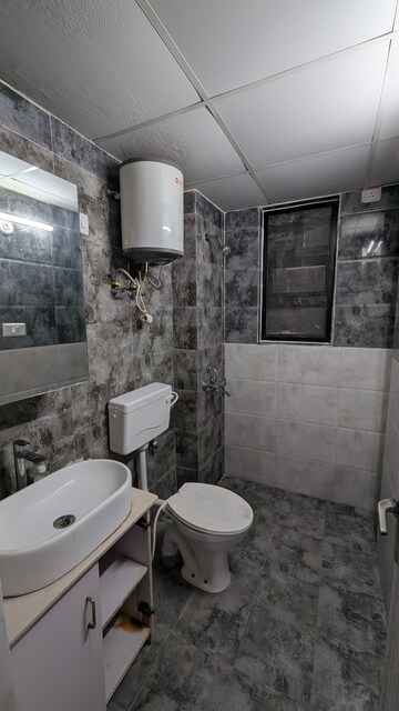 Bathroom in 2.5 BHK Apartment at Omaxe New Heights, Sector 78 – for Rent