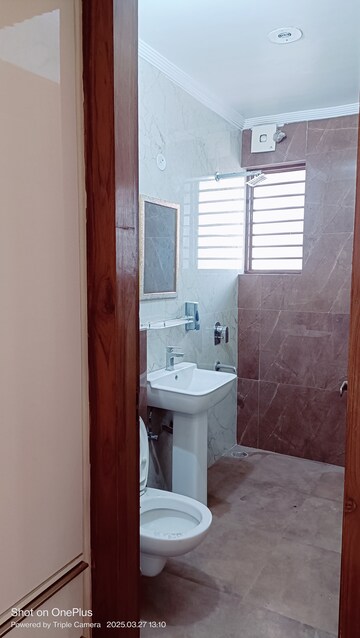 Bathroom in 4 BHK Builder Floor at Ashoka Enclave 3, Sector 35 – for Rent