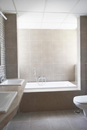 Bathroom in 4 BHK Apartment at Conscient Heritage Max, Sector 102 – for Rent