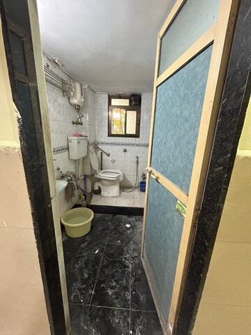 Bathroom in 2 BHK Apartment at River Park Complex, Dahisar East – for Rent