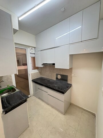 Kitchen in 2 BHK Apartment at Signature The Millennia 2, Sector 37d – for Rent