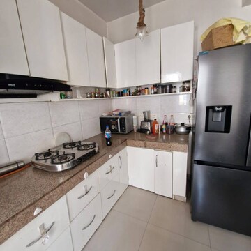 Kitchen in 3 BHK Apartment at Amrapali Zodiac, Sector 120 – for Rent