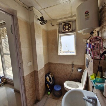 Bathroom in 3 BHK Apartment at Amrapali Zodiac, Sector 120 – for Rent