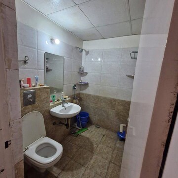Bathroom in 3 BHK Apartment at Amrapali Zodiac, Sector 120 – for Rent