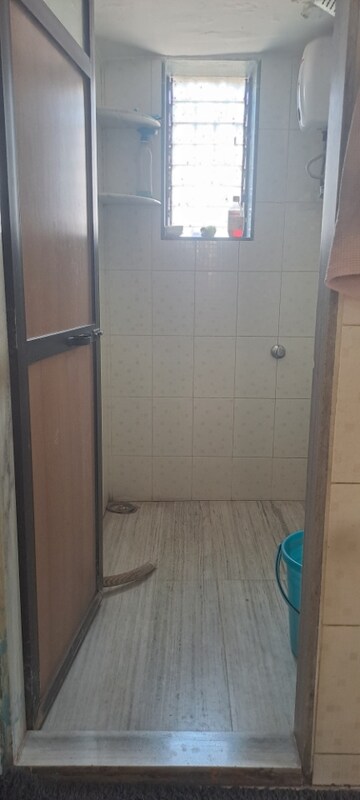 Bathroom in 2 BHK Apartment at Madhur CHS, Malad West – for Rent