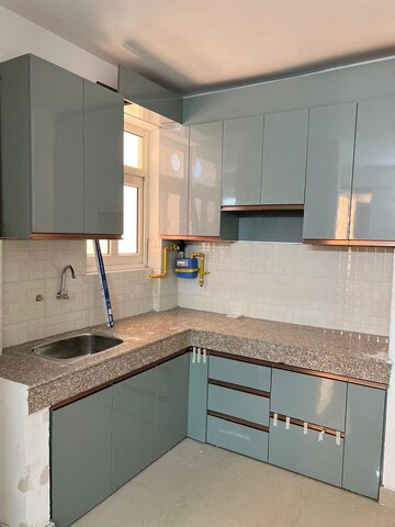 Kitchen in 3 BHK Apartment at ROF Amaltas, Sector 92 – for Rent