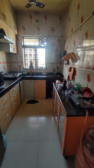 Kitchen in 2 BHK Apartment at Haware Splendor, Kharghar – for Rent