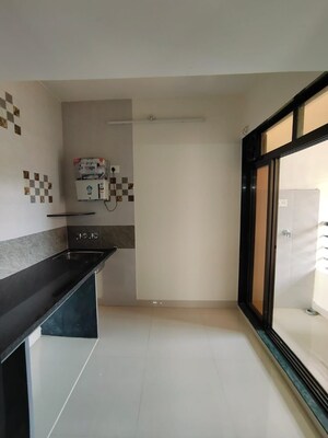 Kitchen in 1 BHK Apartment at Shashwat Angan, Badlapur East – for Sale