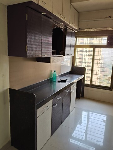 Kitchen in 3 BHK Apartment at Acme Ozone, Manpada – for Rent