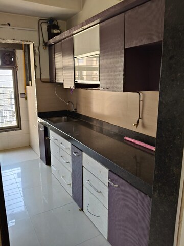Kitchen in 3 BHK Apartment at Acme Ozone, Manpada – for Rent