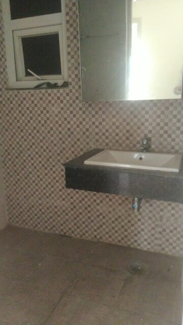 Bathroom in 2 BHK Apartment at Ajnara Le Garden, Sector 16b Greater Noida – for Rent