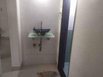 Bathroom in 2 BHK Apartment at Samarth Ashish CHS, Andheri West – for Rent