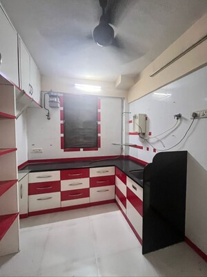 Kitchen in 3 BHK Apartment at Arjun CHS Vasant Vihar, Vasant Vihar – for Sale