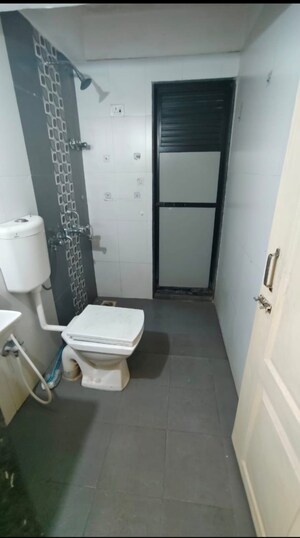 Bathroom in 3 BHK Apartment at Arjun CHS Vasant Vihar, Vasant Vihar – for Sale