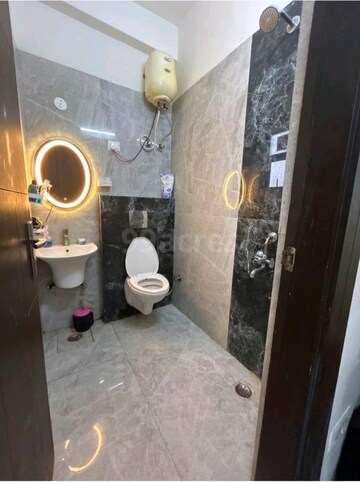 Bathroom in 4 BHK Builder Floor at Niti Khand I – for Rent