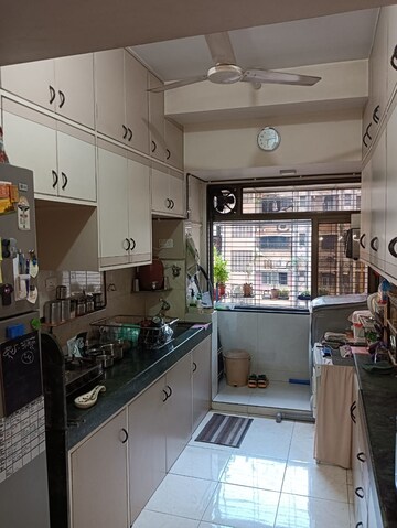 Kitchen in 2 BHK Apartment at Lokhandwala Harmony, Worli – for Rent