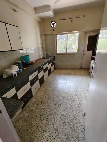 Kitchen in 2 BHK Apartment at 219 Boat Club, Sangamvadi – for Rent