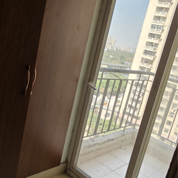 Balcony in 2.5 BHK Apartment at Amrapali Princely Estate, Sector 76 – for Rent
