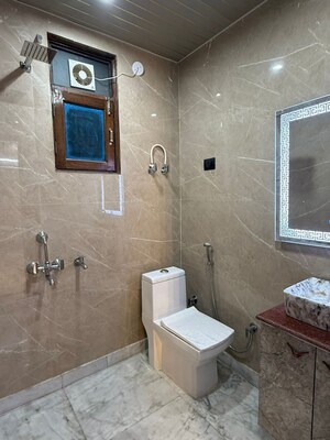 Bathroom in 3 BHK Builder Floor at Chahak Plaza, Shakti Khand – for Sale