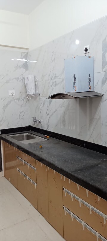 Kitchen in 3 BHK Apartment at Paradise Sai World Empire, Kharghar – for Rent