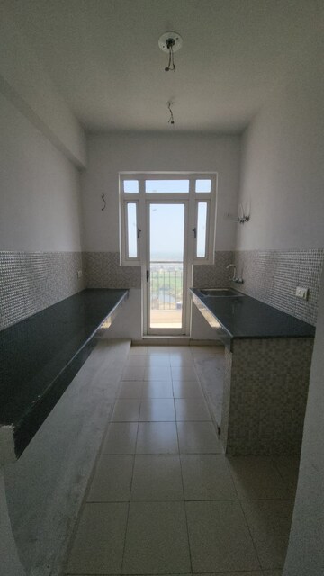 Kitchen in 2 BHK Apartment at Aditya Luxuria Estate, Dasna – for Rent