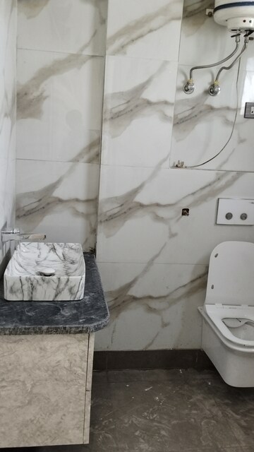 Bathroom in 2.5 BHK Builder Floor at Rohini Sector 11 – for Rent