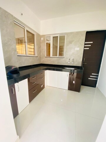 Kitchen in 2 BHK Apartment at GK Rose Mansion, Punawale – for Rent