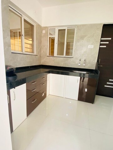 Kitchen in 2 BHK Apartment at GK Rose Mansion, Punawale – for Rent