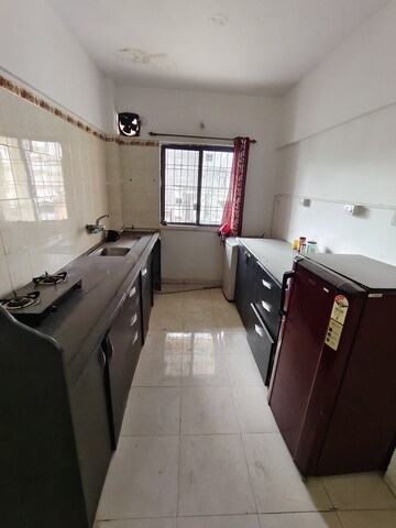 Kitchen in 2 BHK Apartment at Naiknavare Trinity Court, Koregaon Park – for Rent