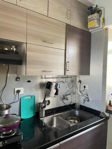 Kitchen in 2.5 BHK Apartment at Cosmos Lounge, Manpada – for Sale