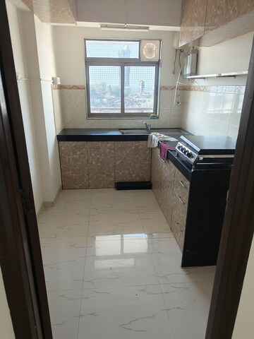 Kitchen in 2 BHK Apartment at Lokhandwala Harmony, Worli – for Rent