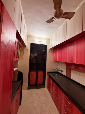 Kitchen in 3 BHK Apartment at Vasant Smruti Apartment, Kandivali East – for Rent
