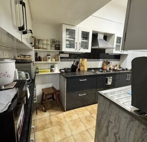 Kitchen in 1 BHK Apartment at Cumbala Hill – for Sale