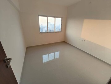 Room in 2 BHK Apartment at Omkar Signet, Malad East – for Rent